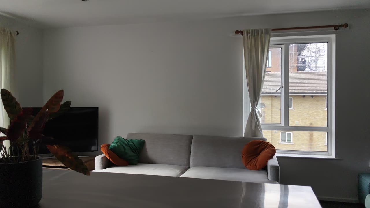 Panning video through a Hackney living room
